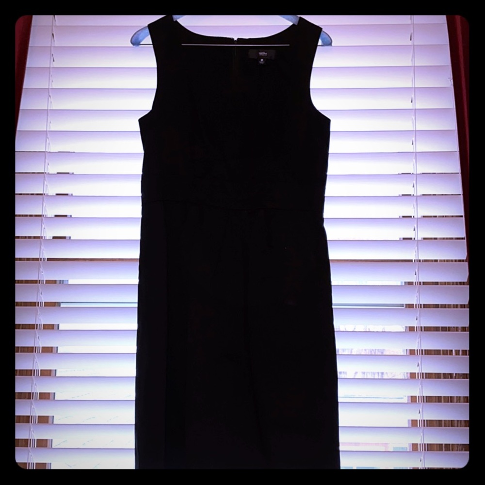 Black fitted dress at the waist